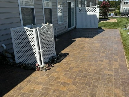 Clean patio and outdoor living area maintained by Kingstone Design & Build